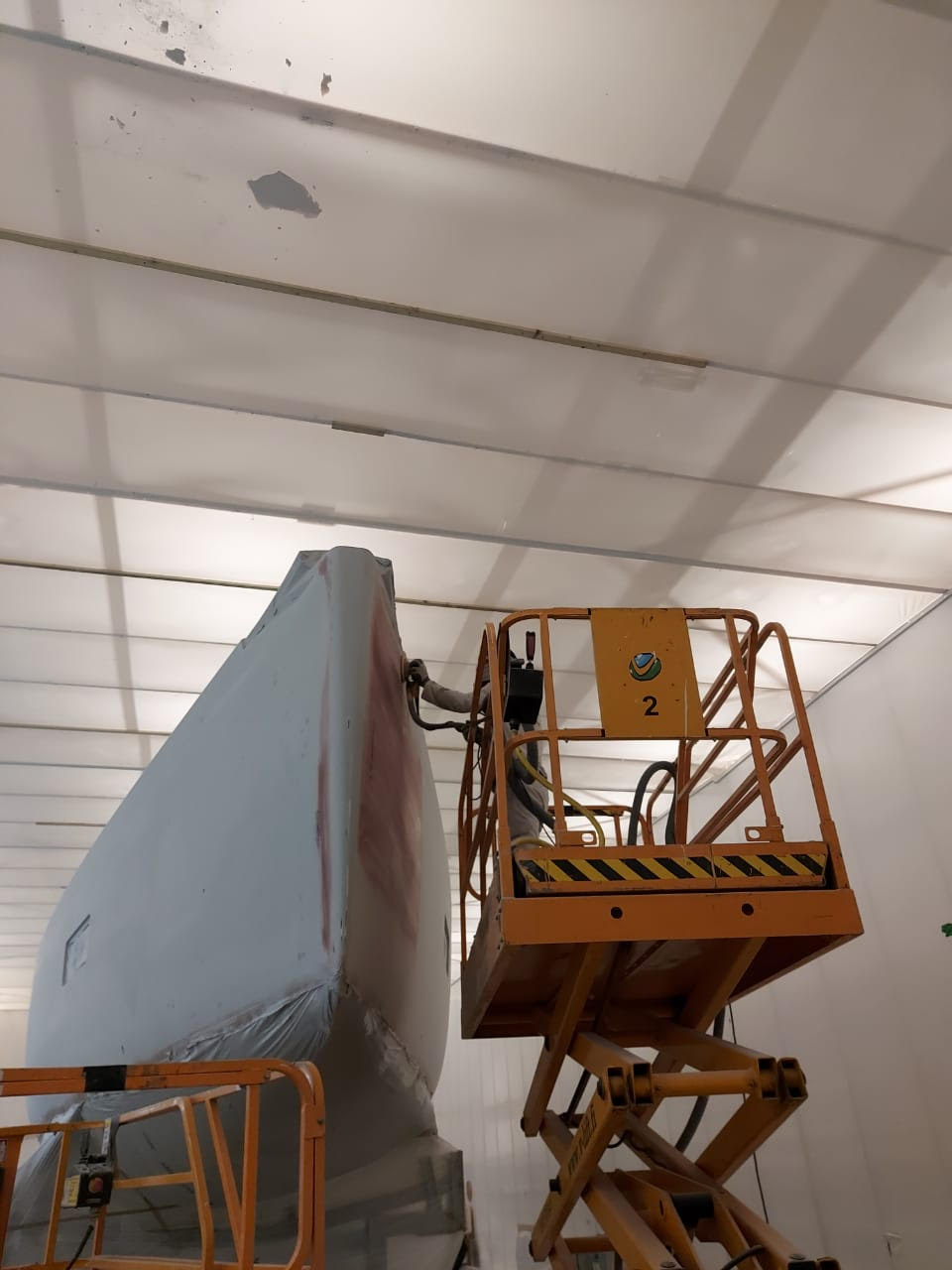 ipaff-qualified-worker-applying-filler-on-yacht